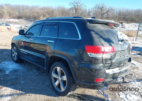 2014 Jeep Grand Cherokee Overland z USA, uszkodzony, nr VIN 1C4RJFCG3EC241606